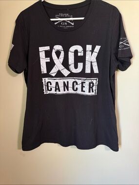 WOMAN’S GRUNT STULE F CANCER TSHIRT-
TAGGED XXL FITS TIGHT WORE ONCE -